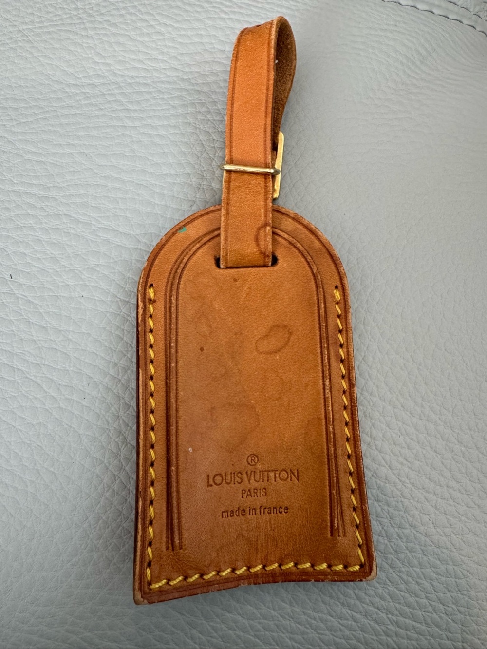 Authentic Louis Vuitton Tan Leather Luggage Tag with Gold Hardware